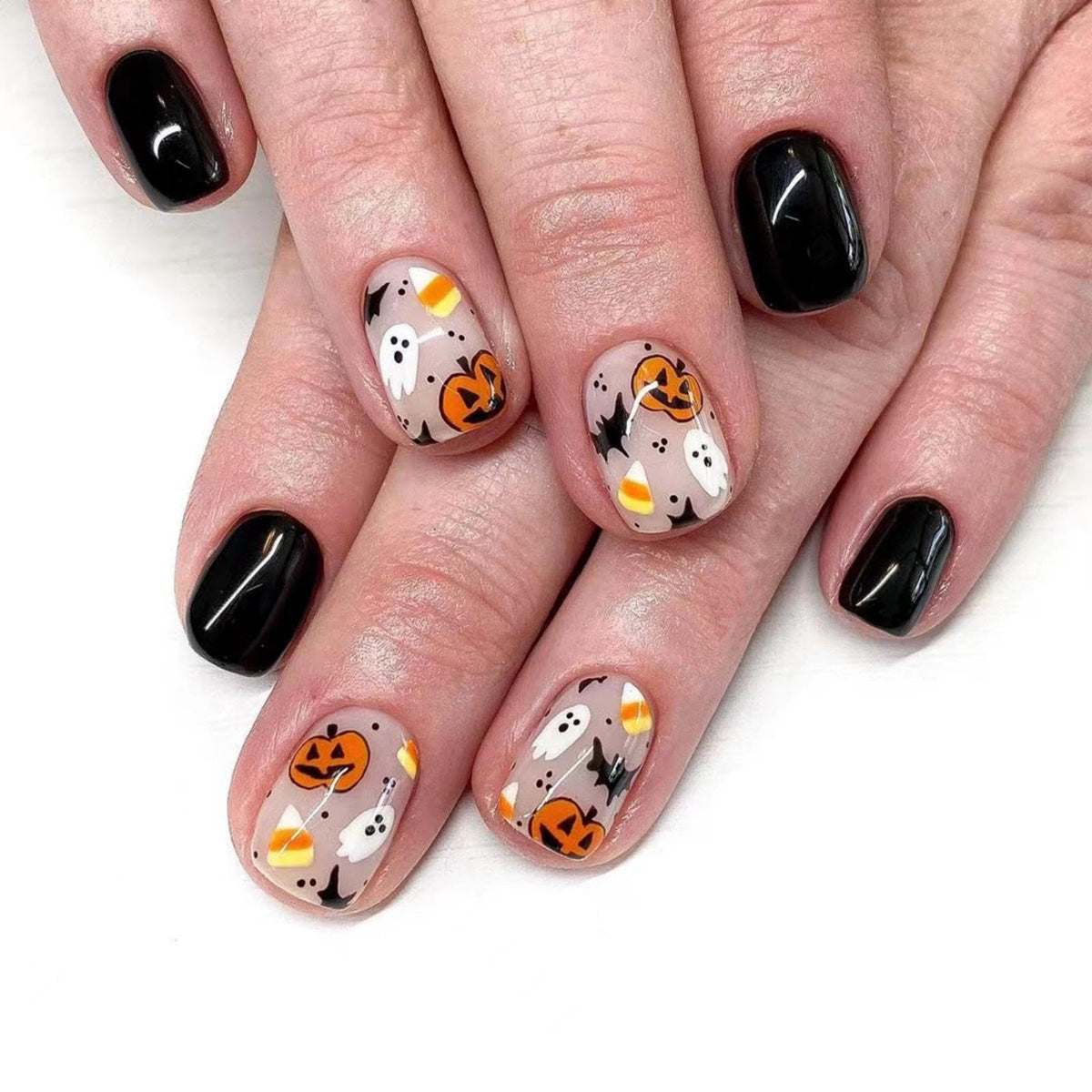 Additional supplier view of the pumpkin, ghost and bat Halloween press-on nails